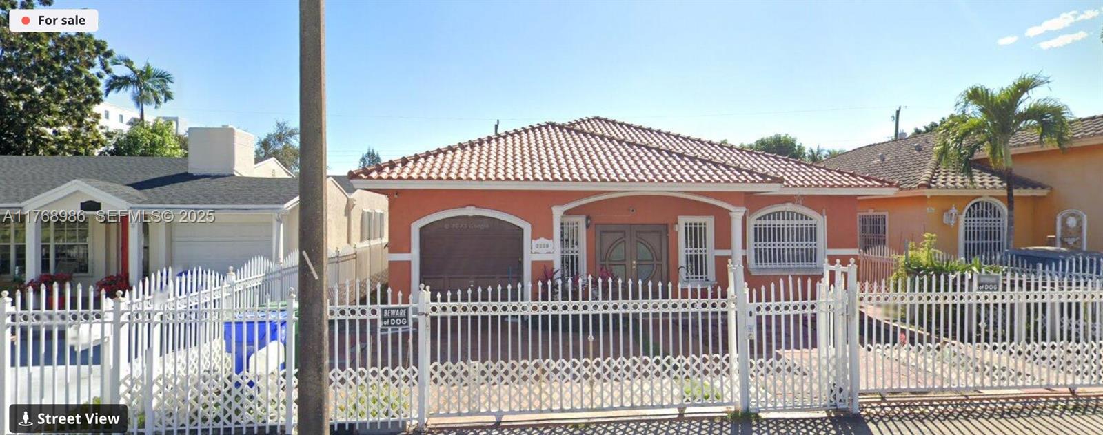 a front view of a house with a porch