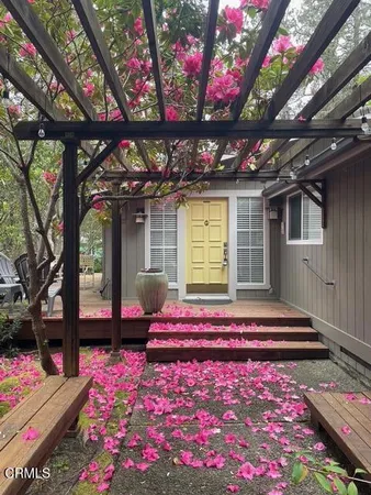 a front view of a house with yard