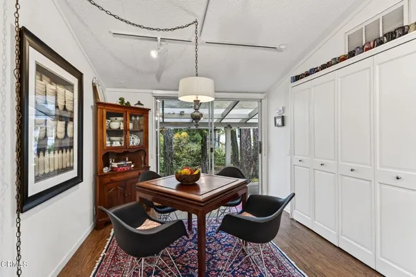 a workspace with furniture and window
