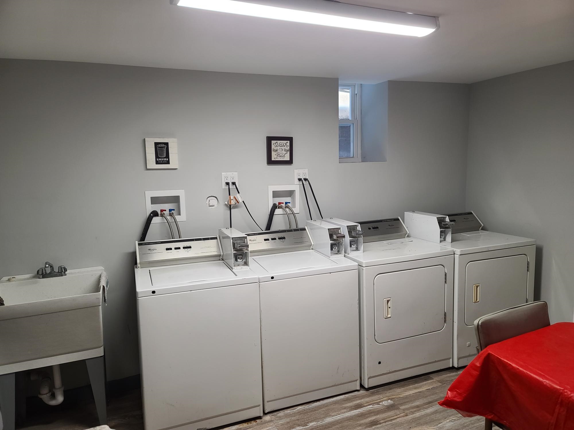 289 Day Avenue, Unit A4 Fairview, NJ 07022 - Photo 7 of 7 a utility room with dryer and washer