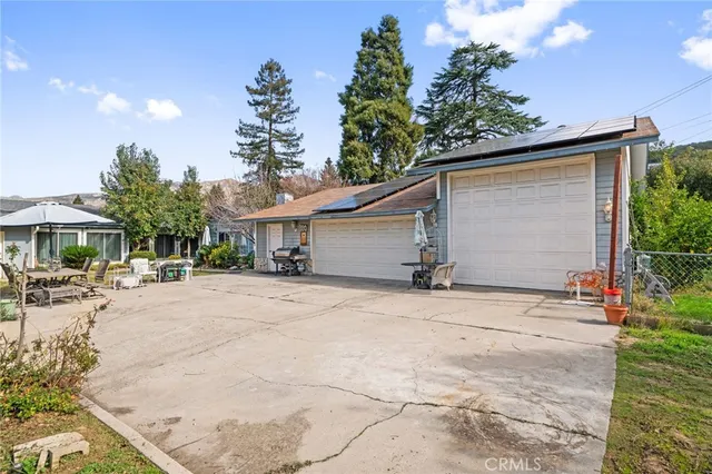 an aerial view of a house with a garden