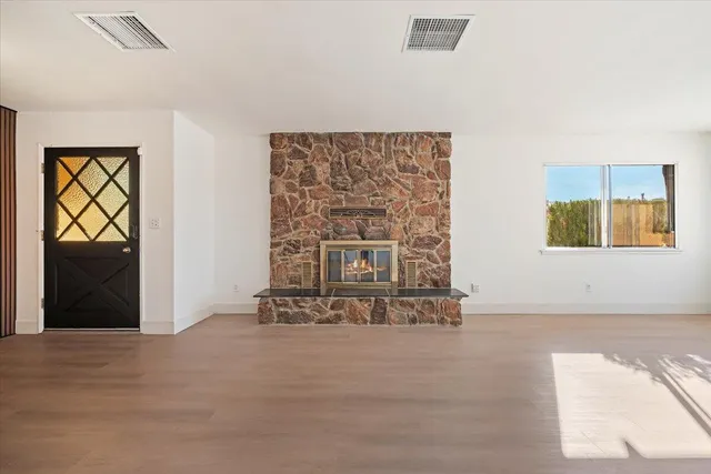 a view of livingroom with furniture and natural light