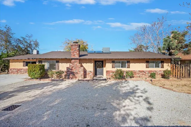 front view of a house with a patio