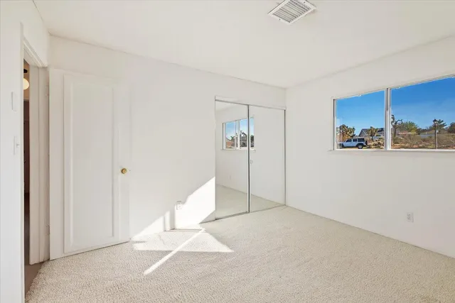 an empty room with windows