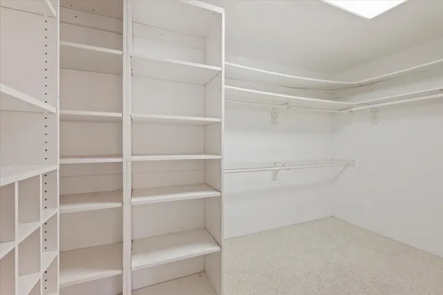 a backyard of a house with yard and outdoor seating