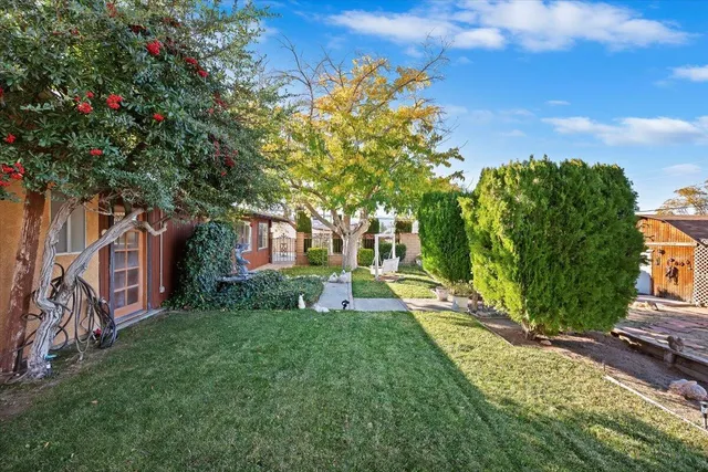 a view of a street with a building in the background