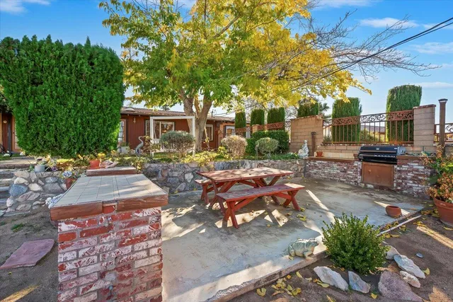 a view of empty room with wooden walls