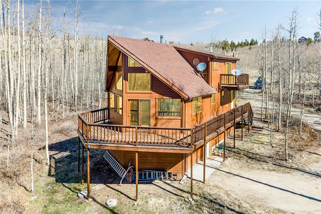 1579 Sheep Ridge Road Fairplay, CO 80440 - Photo 1 of 35 a view of a roof deck with table and chairs