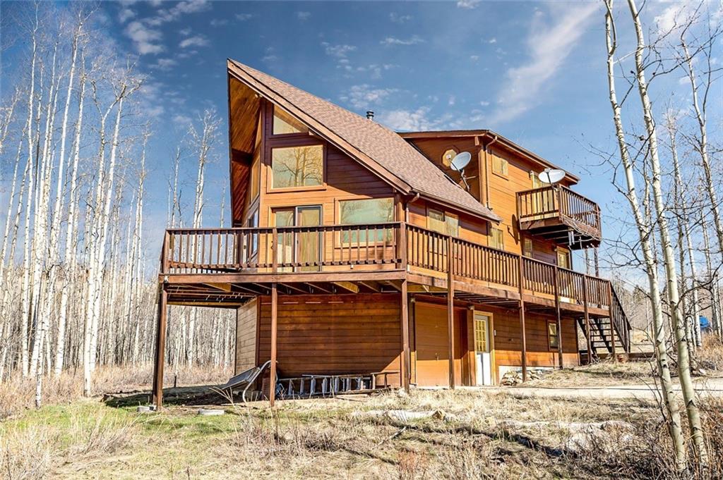 1579 Sheep Ridge Road Fairplay, CO 80440 - Photo 17 of 35 a front view of a house with garden
