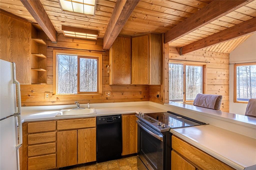 1579 Sheep Ridge Road Fairplay, CO 80440 - Photo 20 of 35 a kitchen that has a sink and a stove