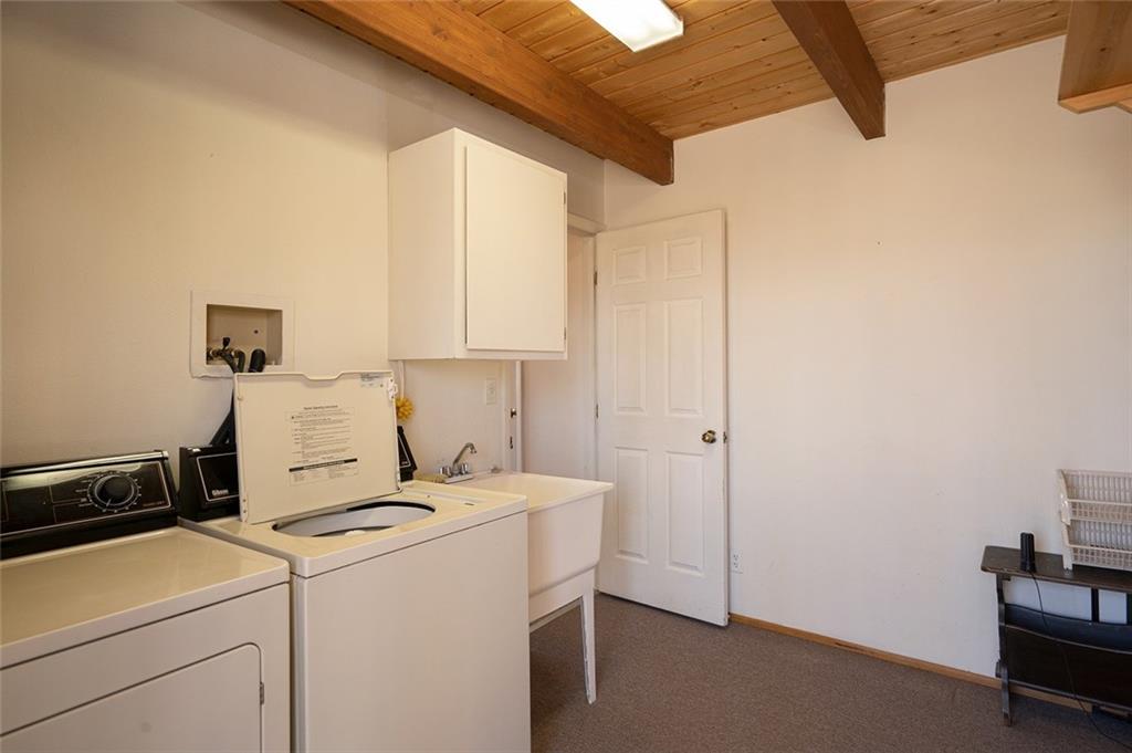 1579 Sheep Ridge Road Fairplay, CO 80440 - Photo 24 of 35 a view of storage and utility room with washer and dryer