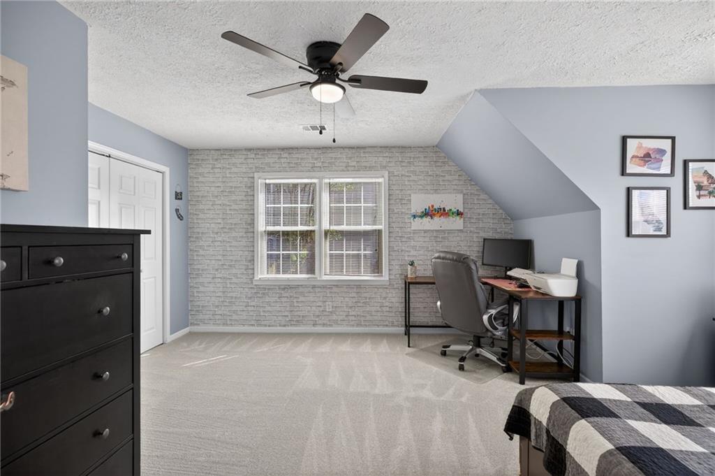 53 Crestview Drive Dallas, GA 30157 - Photo 25 of 46 a bedroom with a workspace