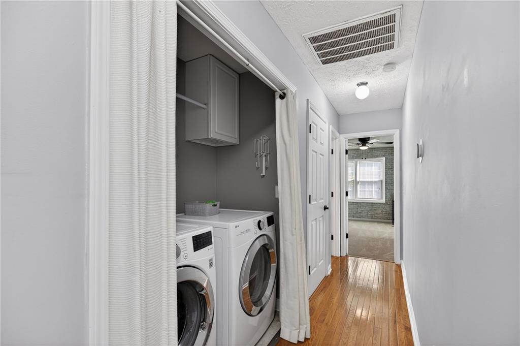 53 Crestview Drive Dallas, GA 30157 - Photo 28 of 46 a view of a hallway with washer and dryer