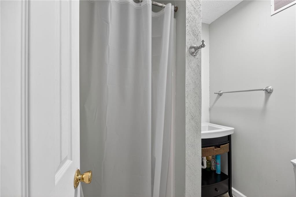 53 Crestview Drive Dallas, GA 30157 - Photo 29 of 46 a bathroom with a shower