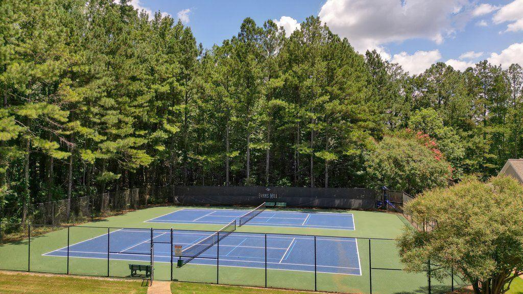 53 Crestview Drive Dallas, GA 30157 - Photo 43 of 46 a view of a tennis ground with large trees