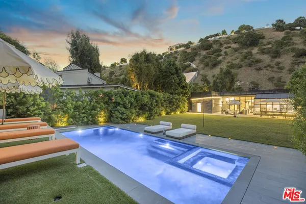 a view of a yard with an outdoor space