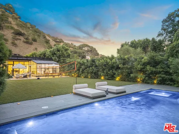 a view of a yard with an outdoor space