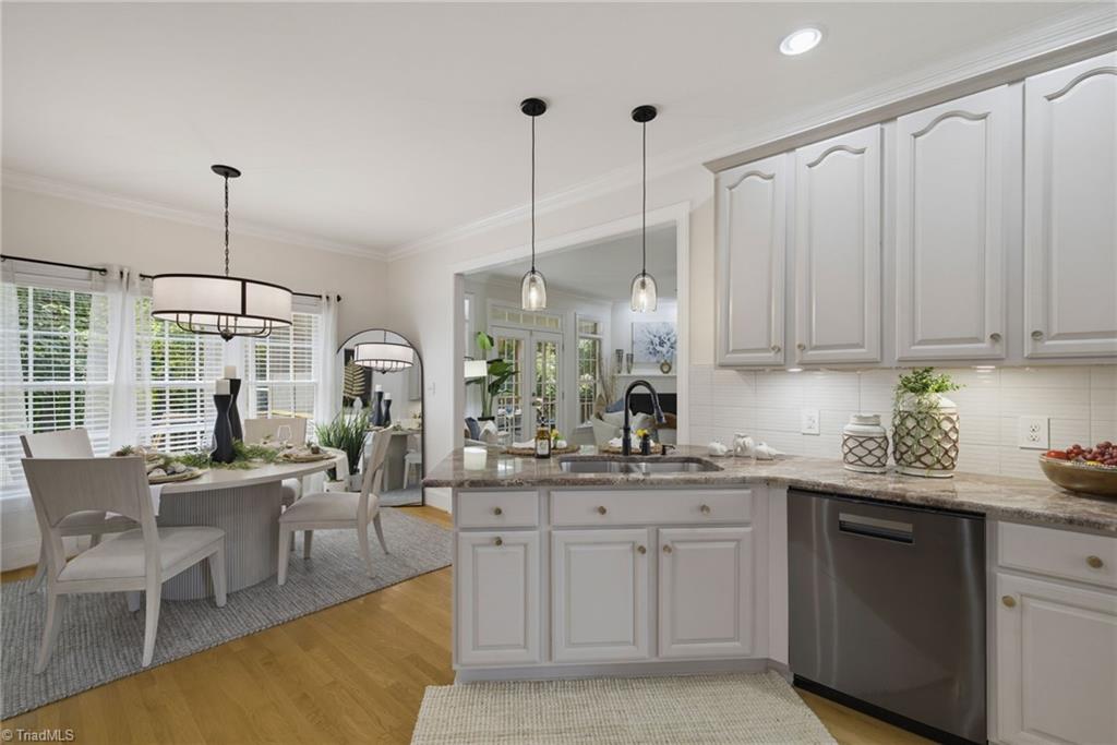 5411 Effieham Street Oak Ridge, NC 27310 - Photo 16 of 49 Breakfast area off of the kitchen makes for ease with everyday meals