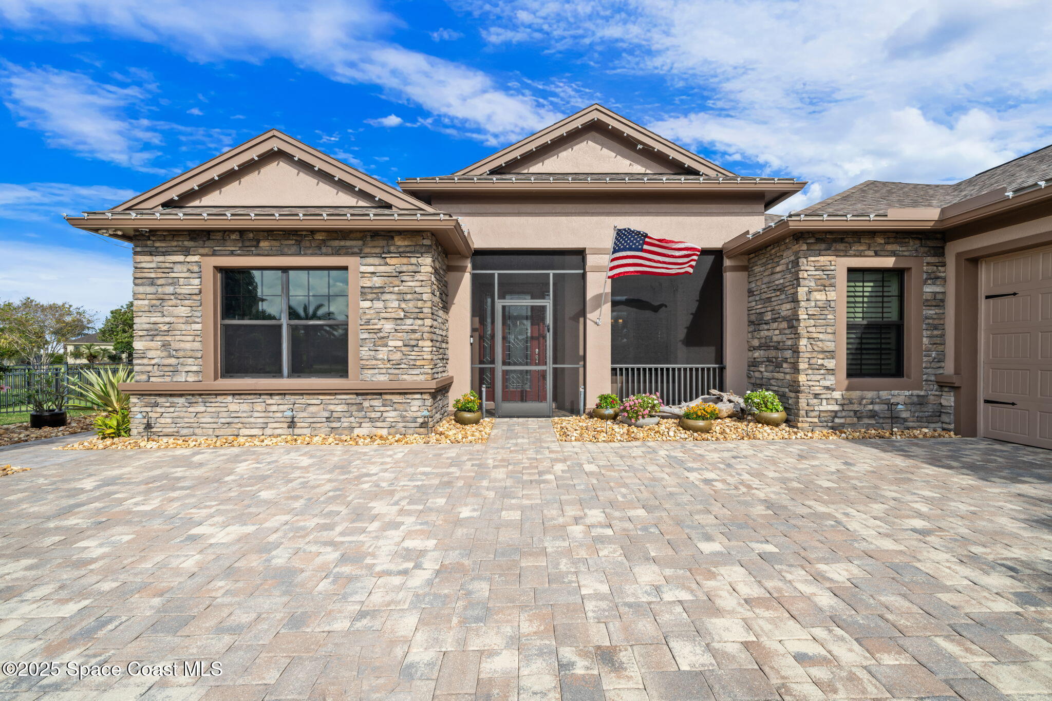 2803 Agilny Lane Melbourne, FL 32940 - Photo 14 of 65 a front view of a house with a yard