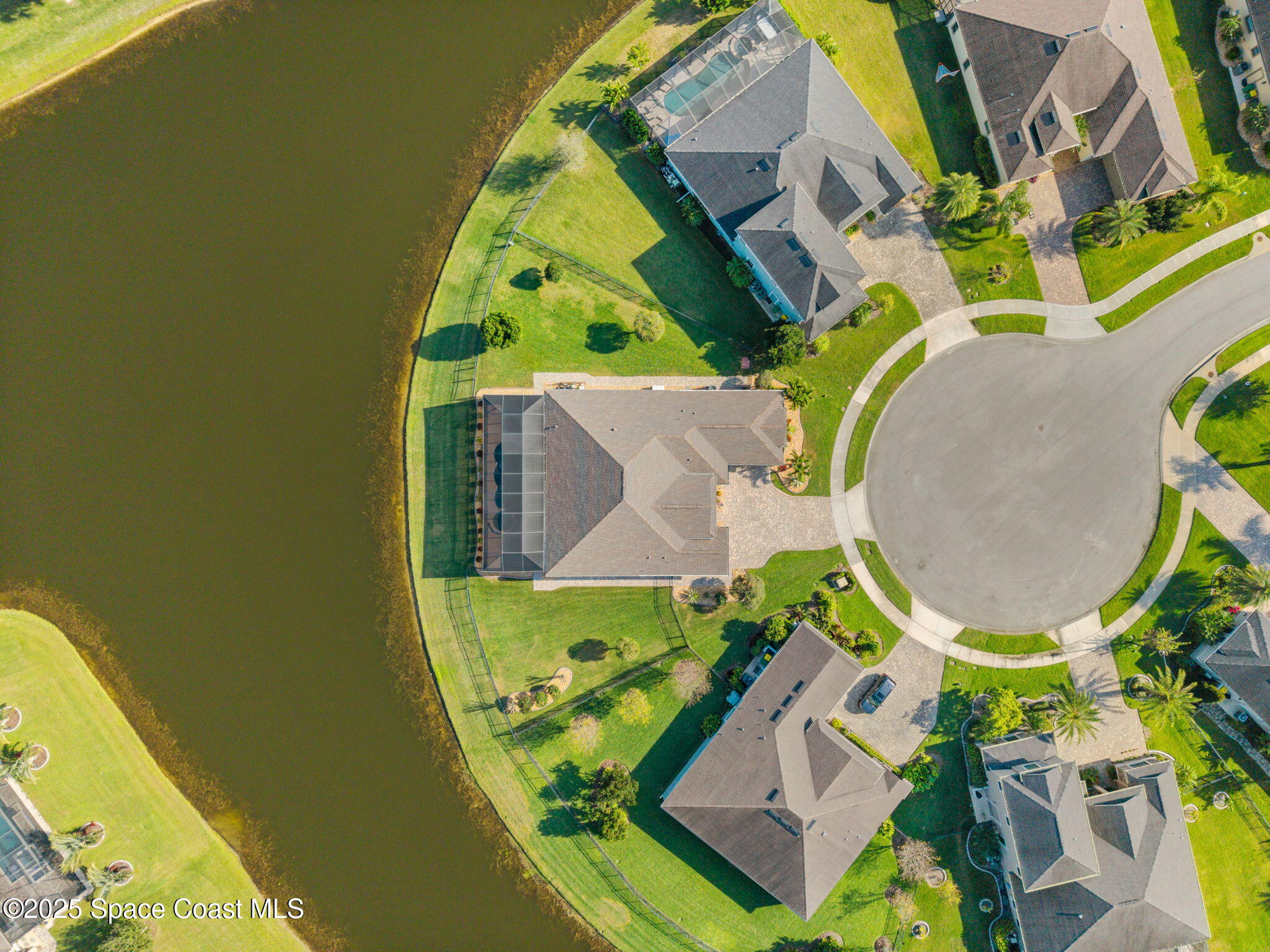 2803 Agilny Lane Melbourne, FL 32940 - Photo 10 of 65 an aerial view of a swimming pool