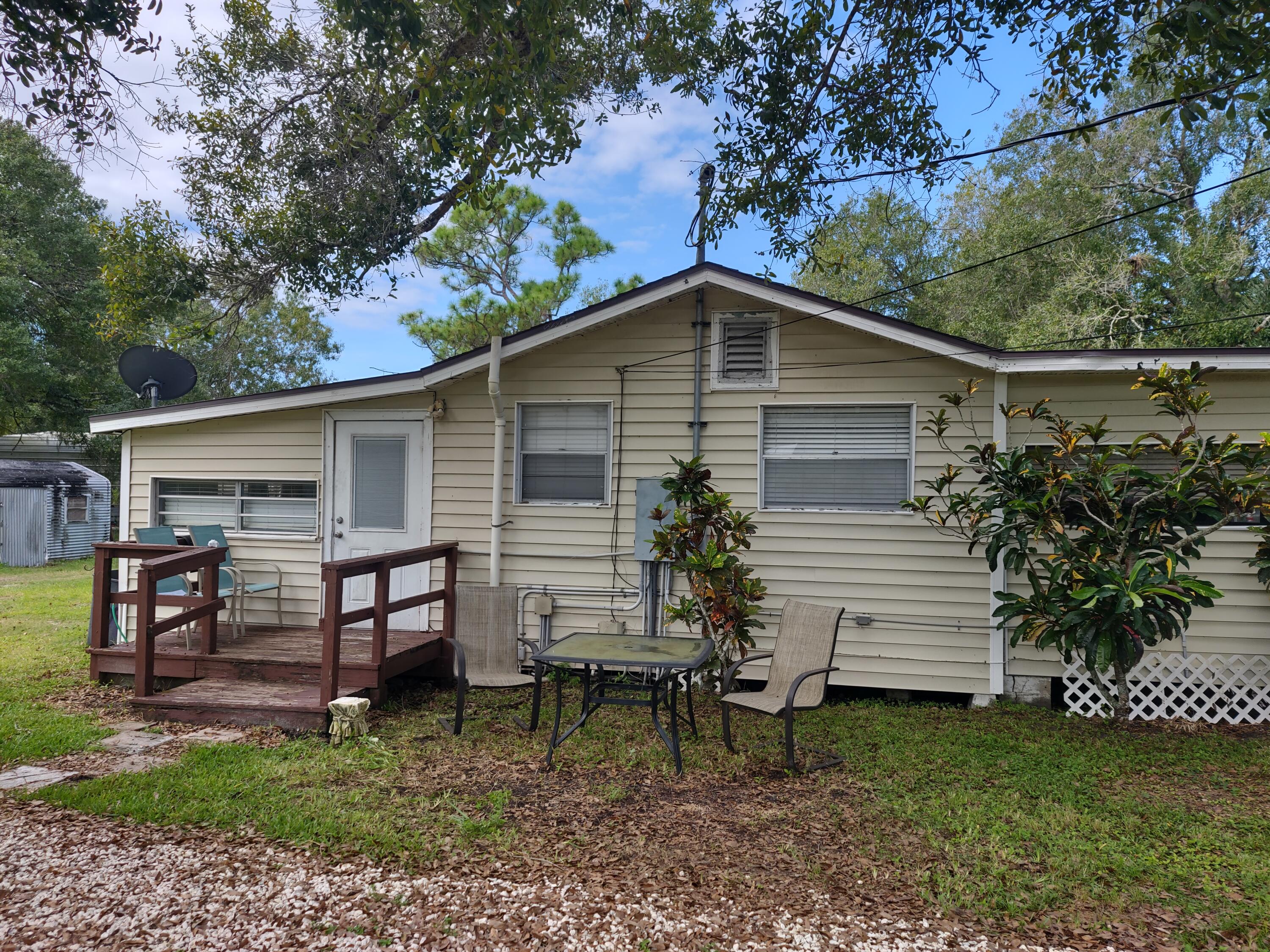 709 Brack Road Fort Pierce, FL 34982 - Photo 3 of 24 SIDE VIEW