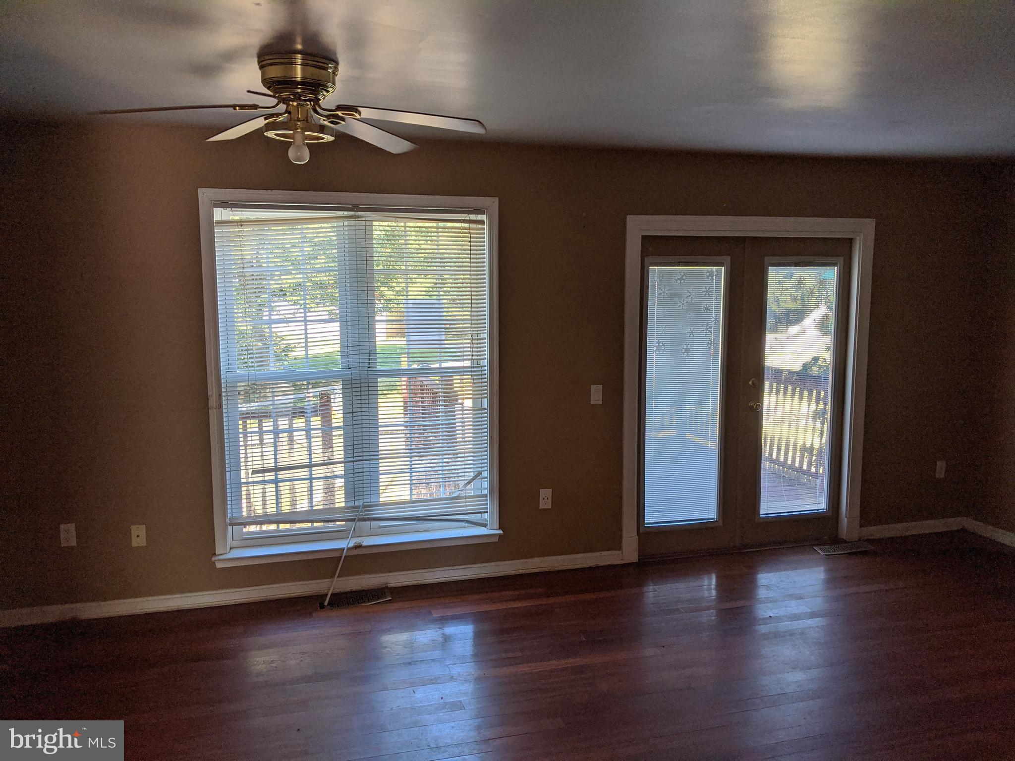 1656 Colonial Way Frederick, MD 21702 - Photo 6 of 18 Living room with access to deck