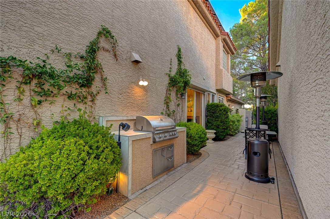 7995 Rio Rico Drive Las Vegas, NV 89113 - Photo 50 of 92 An inviting outdoor cooking station with an integrated grill and ample counter space.