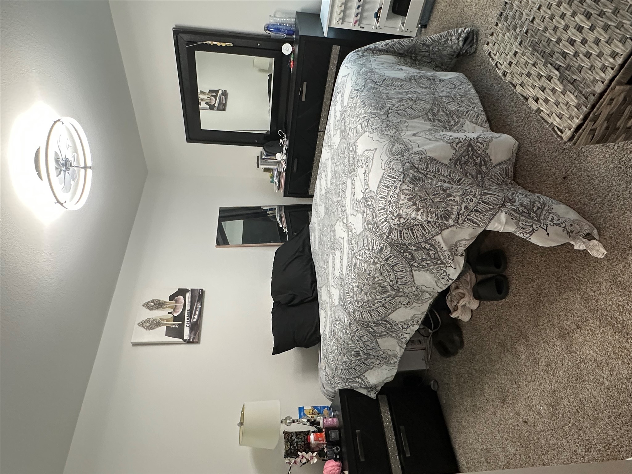 519 Sandringham Loop Kyle, TX 78640 - Photo 20 of 26 Carpeted bedroom featuring a textured ceiling