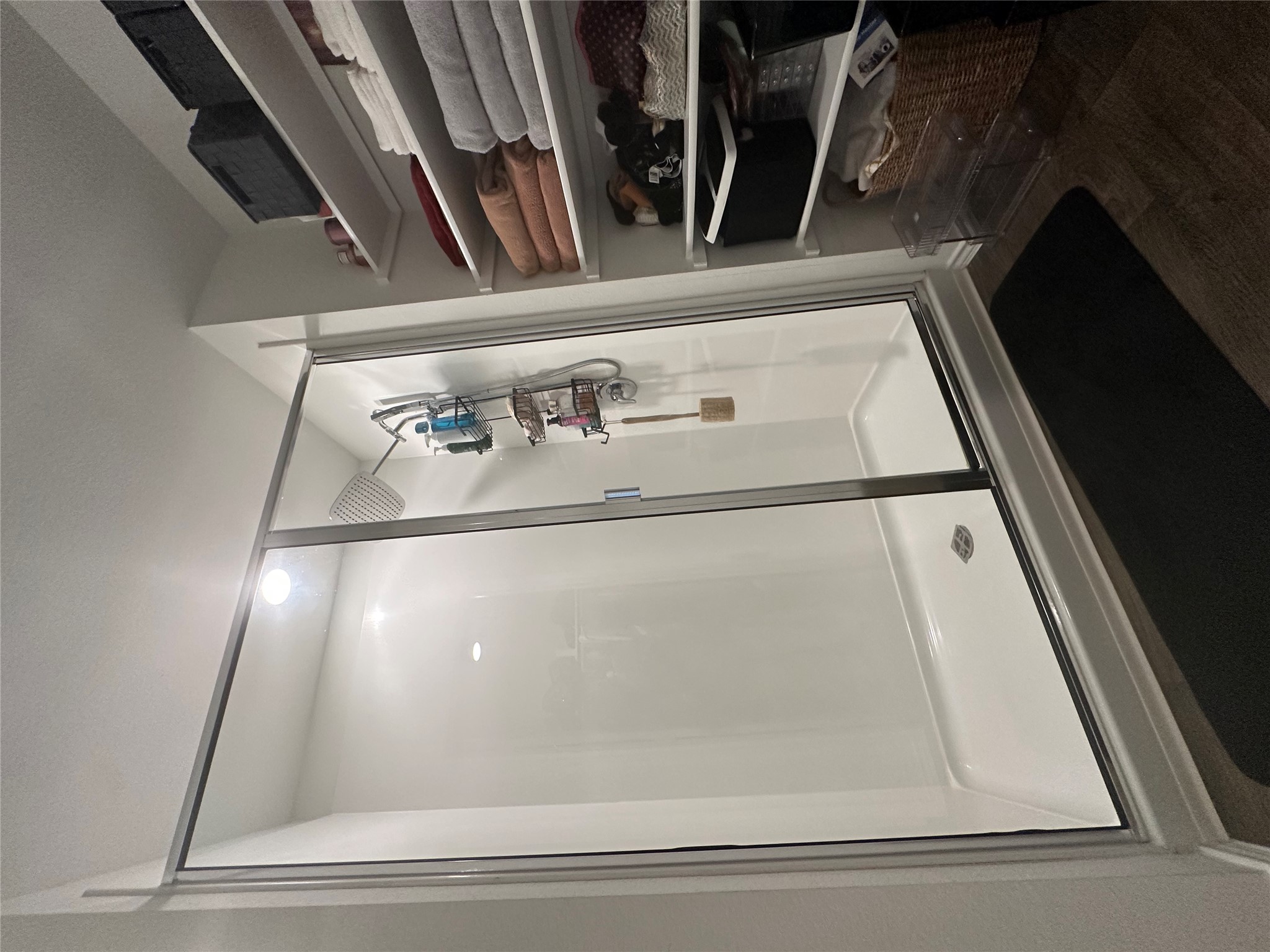 519 Sandringham Loop Kyle, TX 78640 - Photo 5 of 26 Full bath featuring a stall shower and dark wood-style flooring