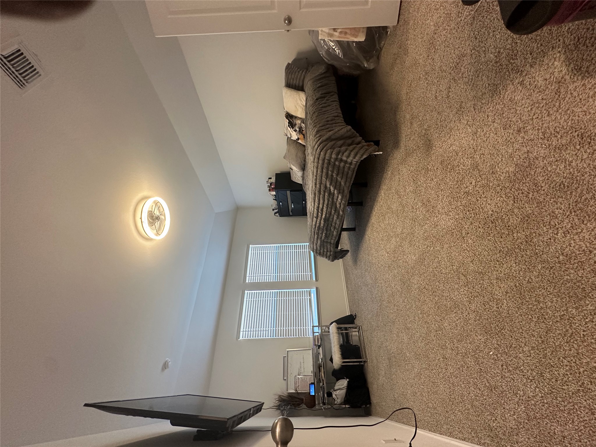 519 Sandringham Loop Kyle, TX 78640 - Photo 6 of 26 Carpeted bedroom featuring baseboards