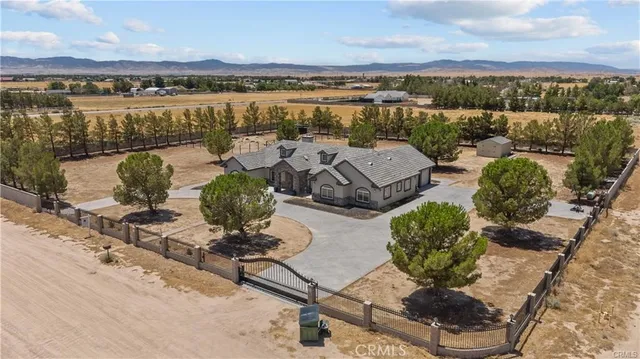 a view of a swimming pool and lounge chair
