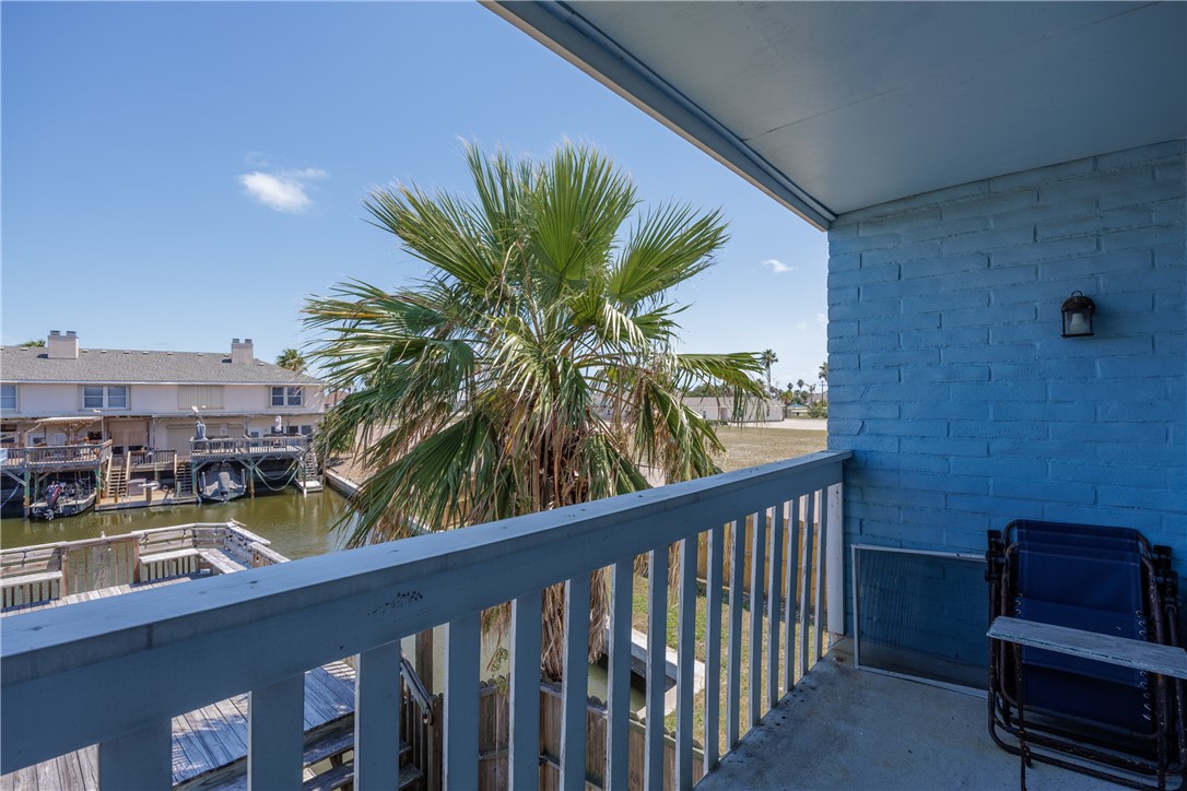 15432 Salt Cay Court, Unit 101 Corpus Christi, TX 78418 - Photo 23 of 37 a view of swimming pool from a balcony