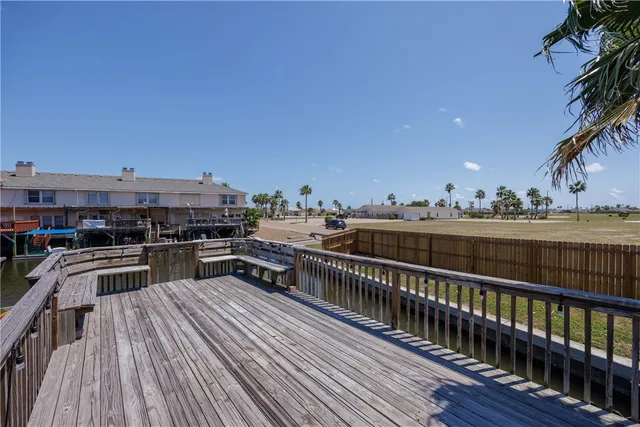 a view of a balcony with furniture
