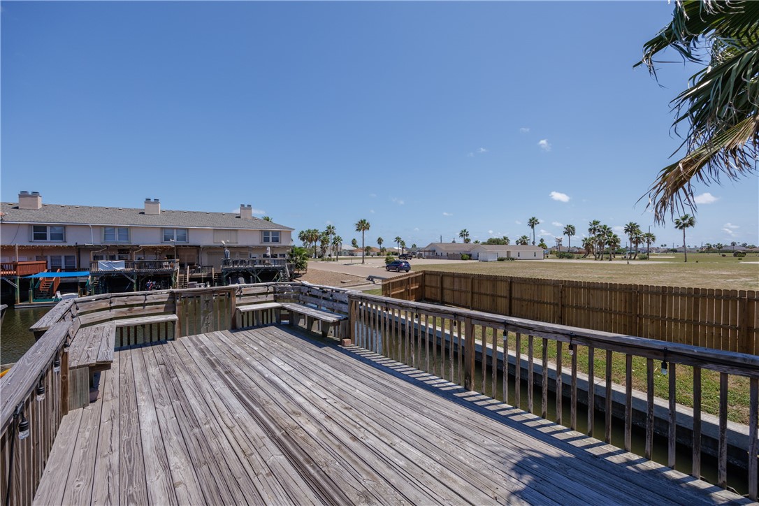 15432 Salt Cay Court, Unit 101 Corpus Christi, TX 78418 - Photo 28 of 37 a view of a balcony with furniture