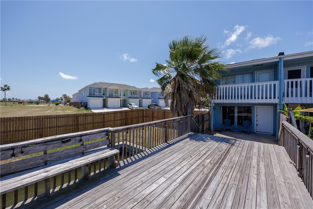 15432 Salt Cay Court, Unit 101 Corpus Christi, TX 78418 - Photo 36 of 37 a view of balcony with deck and wooden floor