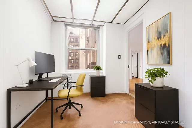 a view of a city with lush green forest