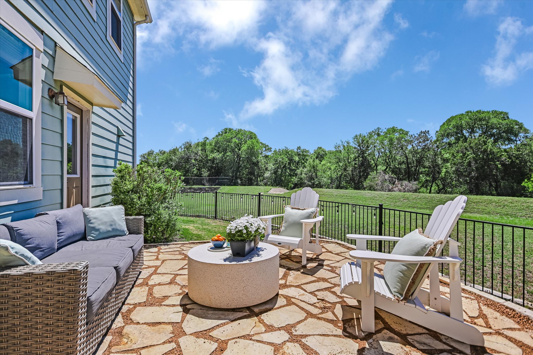 12224 Tawny Farms Road, Unit 145 Austin, TX 78748 - Photo 16 of 27 This beautiful stone patio offers plenty of room to relax and offers a serene view of the greenbelt.