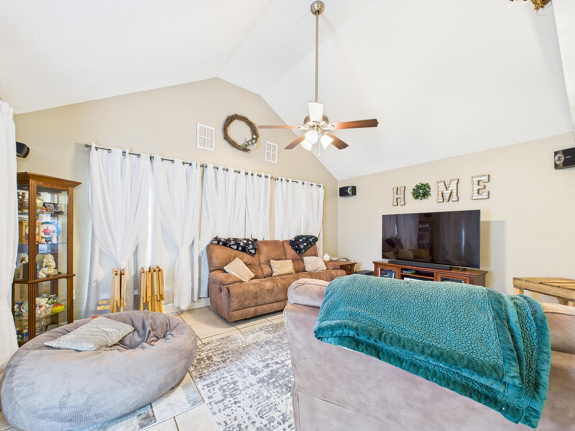 955 Valley Road Crestview, FL 32539 - Photo 15 of 29 a living room with furniture and a flat screen tv