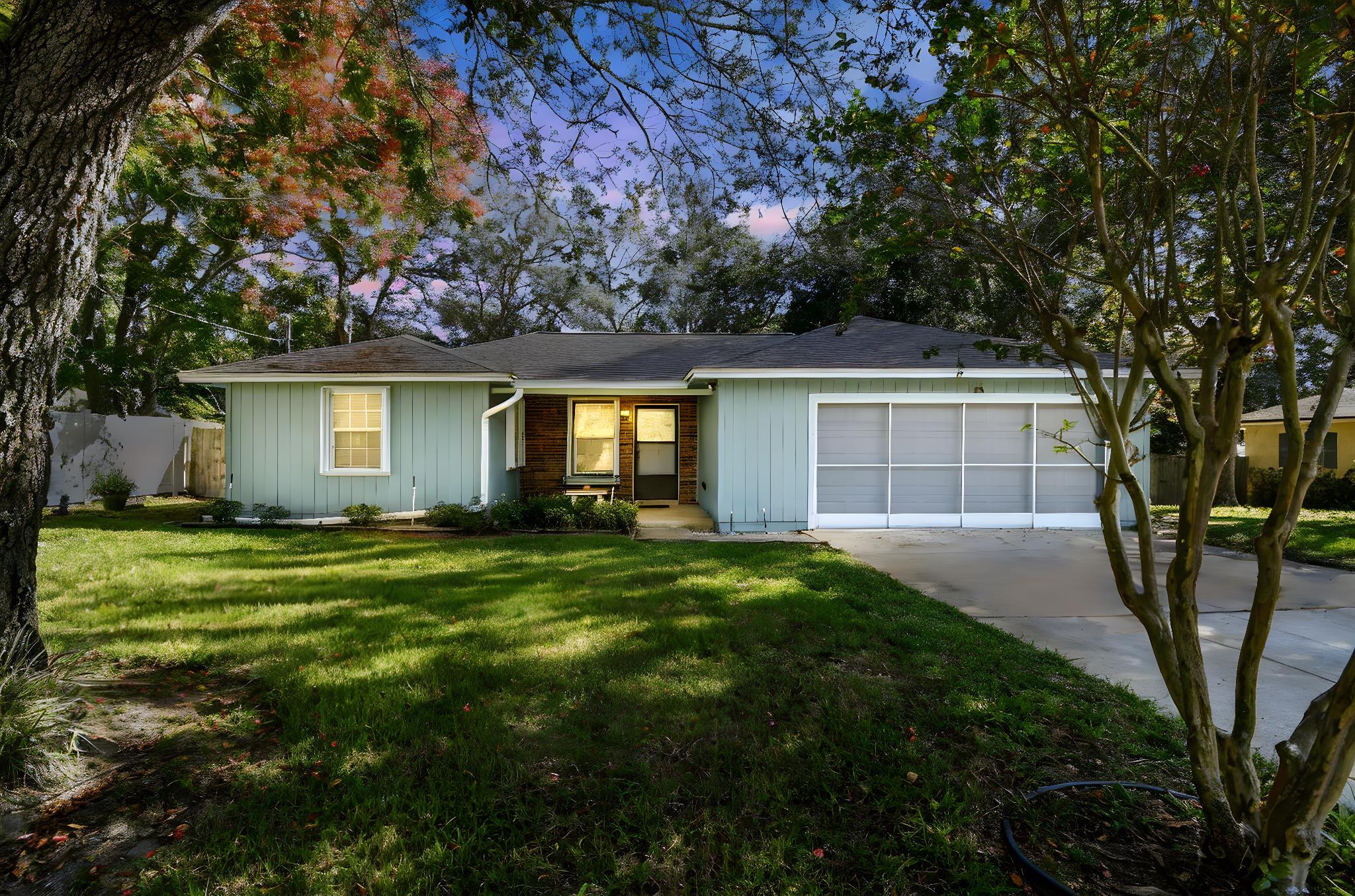 439 Gentian Road St. Augustine, FL 32086 - Photo 1 of 49 front view of a house with a garden
