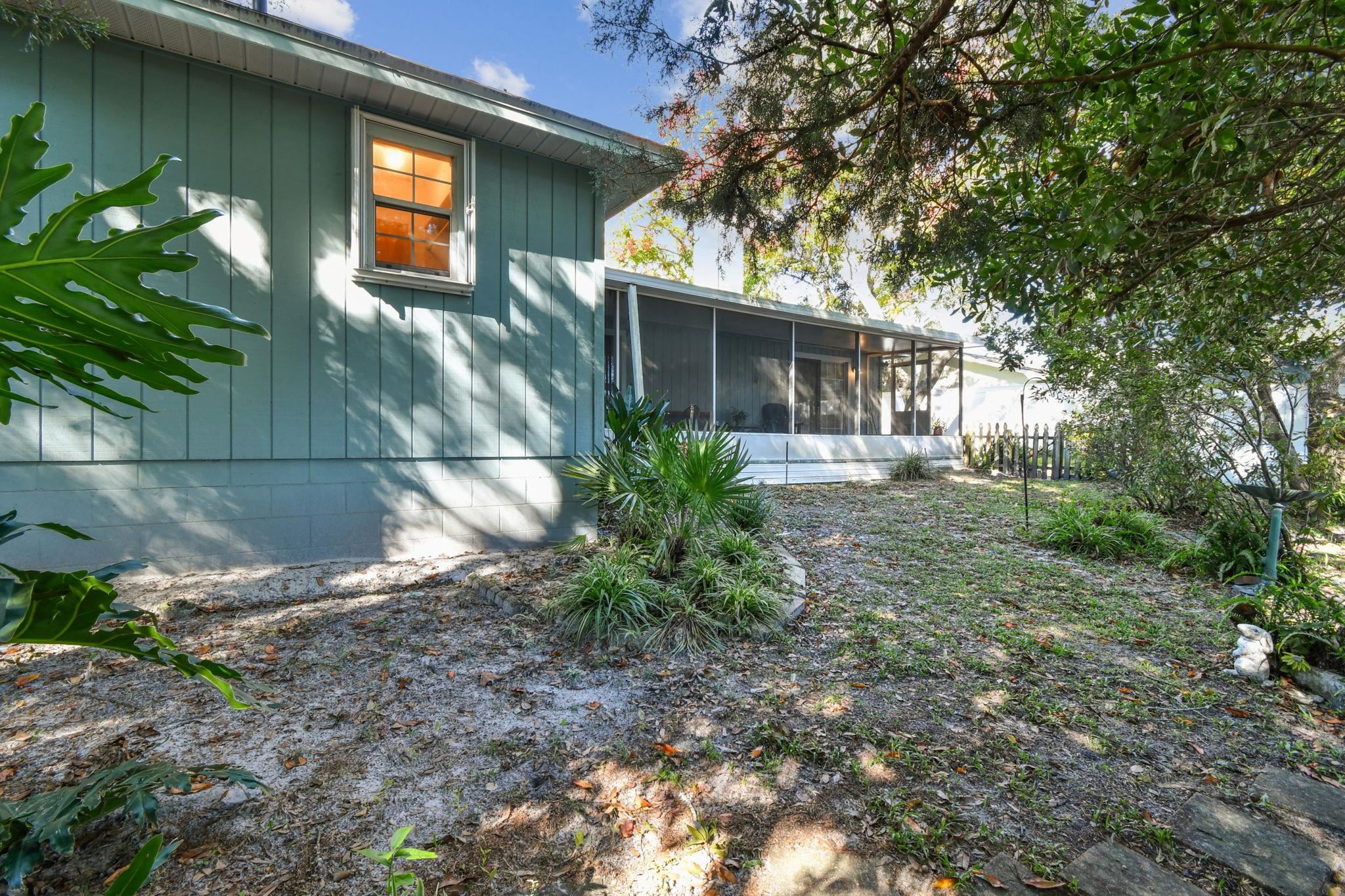 439 Gentian Road St. Augustine, FL 32086 - Photo 34 of 49 a view of a house with a yard