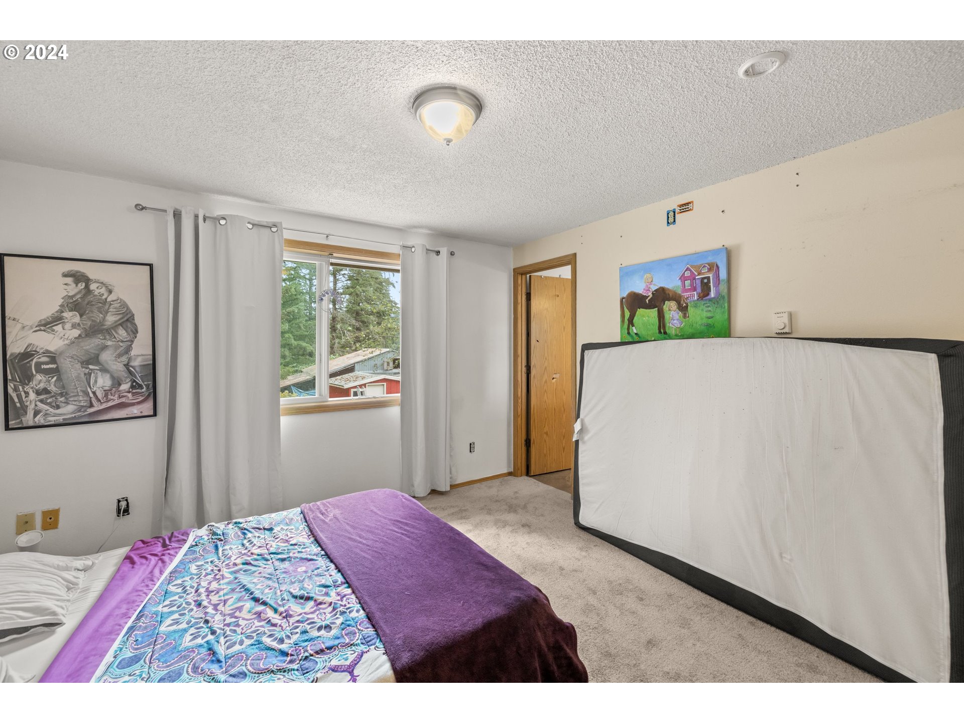 2701 Northeast 292nd Avenue Camas, WA 98607 - Photo 21 of 38 a bedroom with a bed and a window