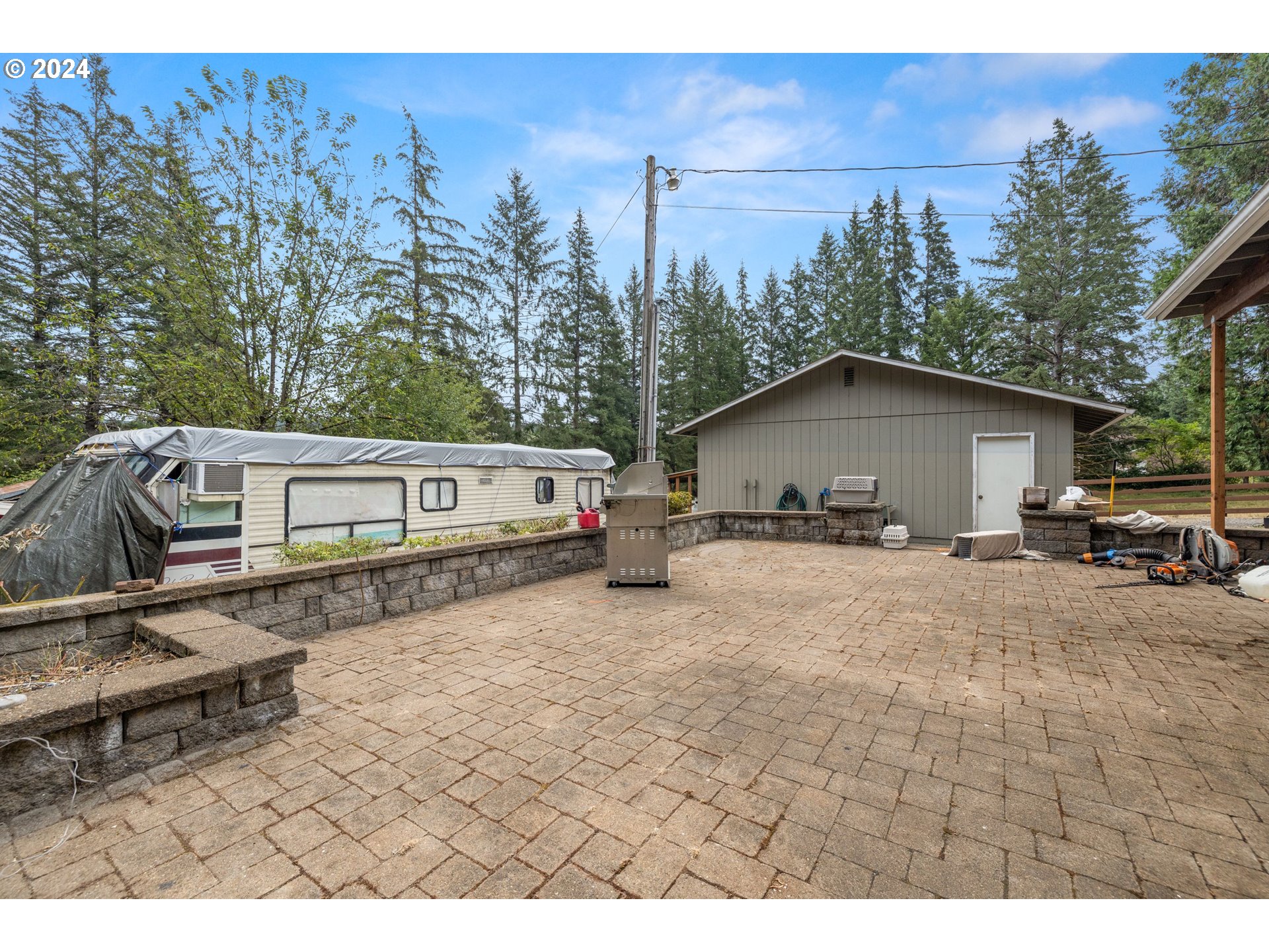 2701 Northeast 292nd Avenue Camas, WA 98607 - Photo 26 of 38 a house with trees in the background