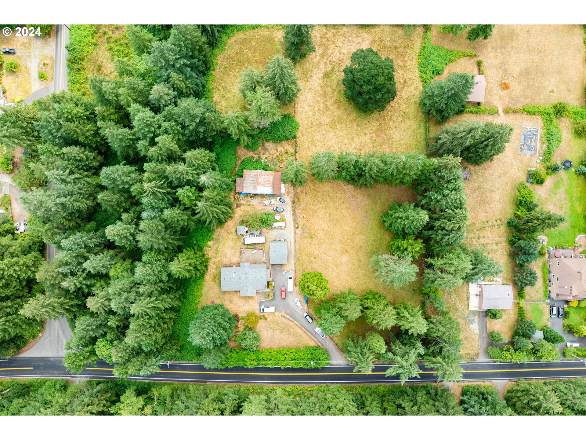 2701 Northeast 292nd Avenue Camas, WA 98607 - Photo 30 of 38 an aerial view of a house with a yard and outdoor seating