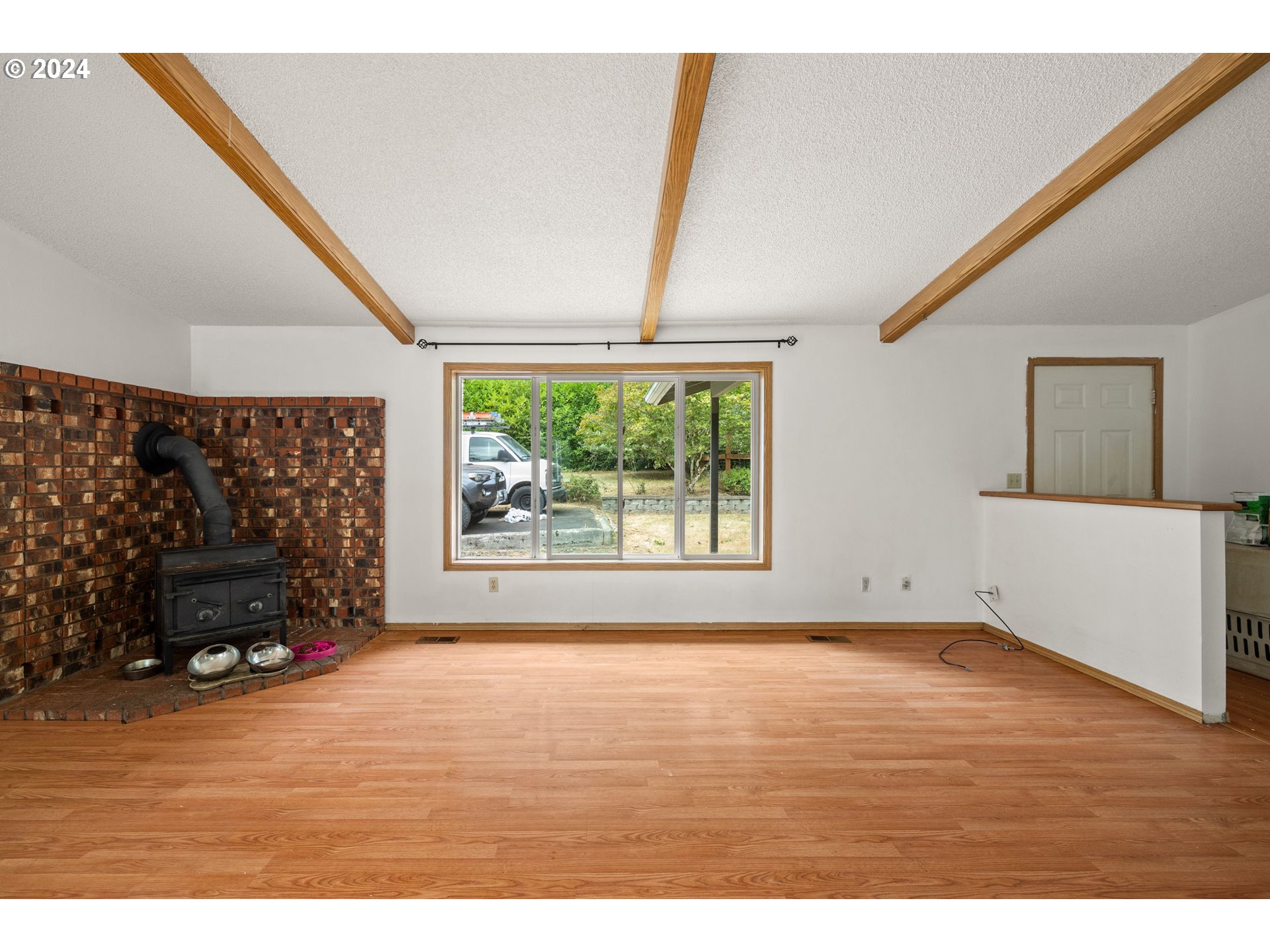 2701 Northeast 292nd Avenue Camas, WA 98607 - Photo 7 of 38 a living room with furniture and a fireplace