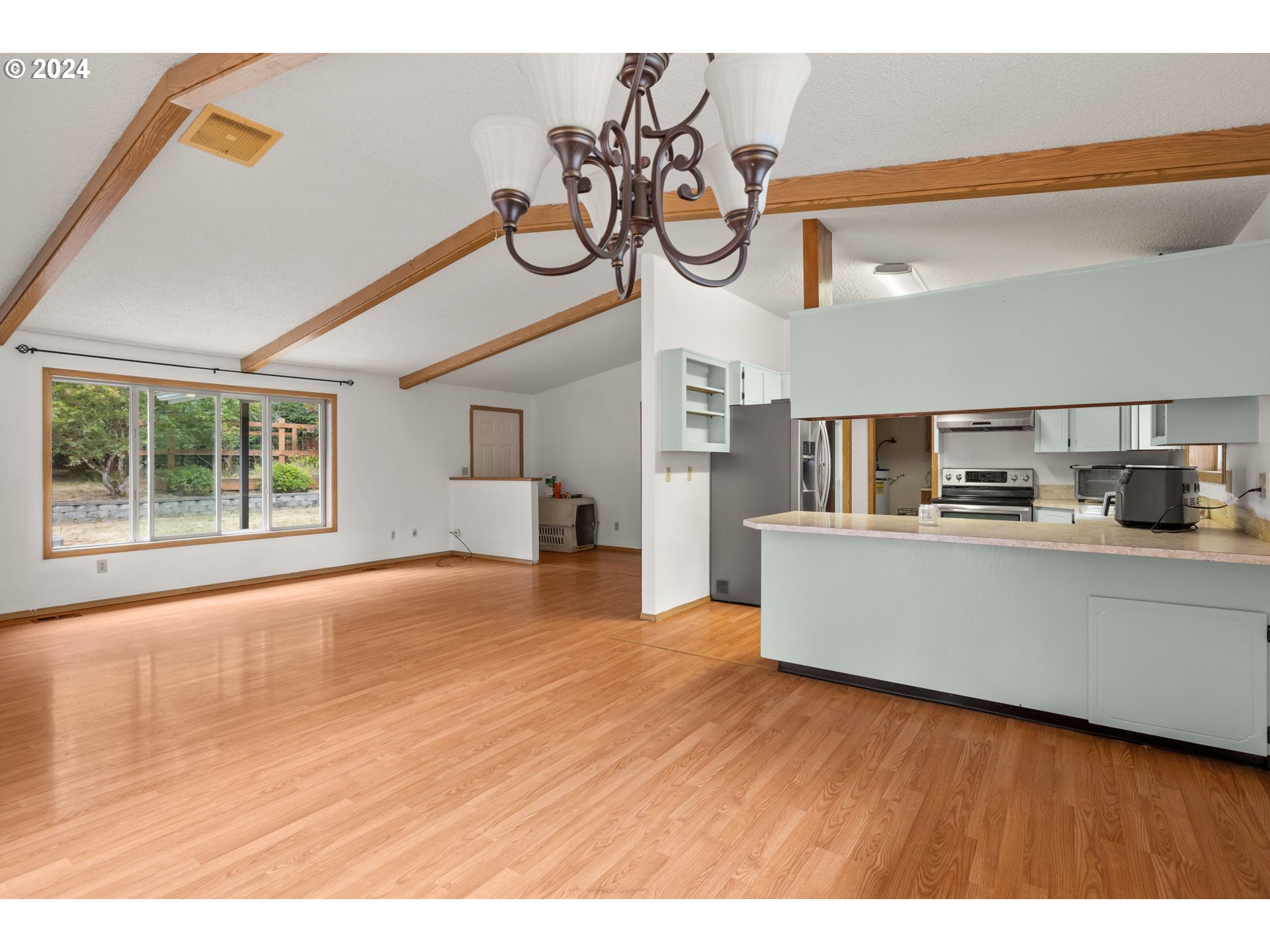 2701 Northeast 292nd Avenue Camas, WA 98607 - Photo 9 of 38 a view of kitchen with furniture and a window