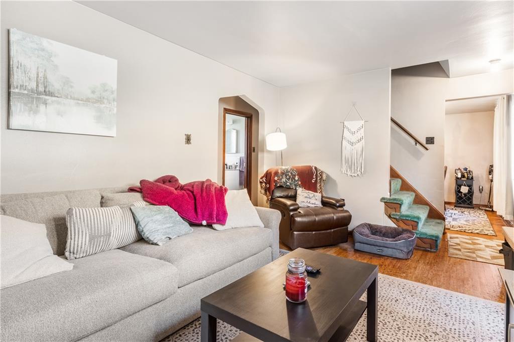 1308 Pine Hollow Road McKees Rocks, PA 15136 - Photo 18 of 25 a living room with furniture and a wooden floor