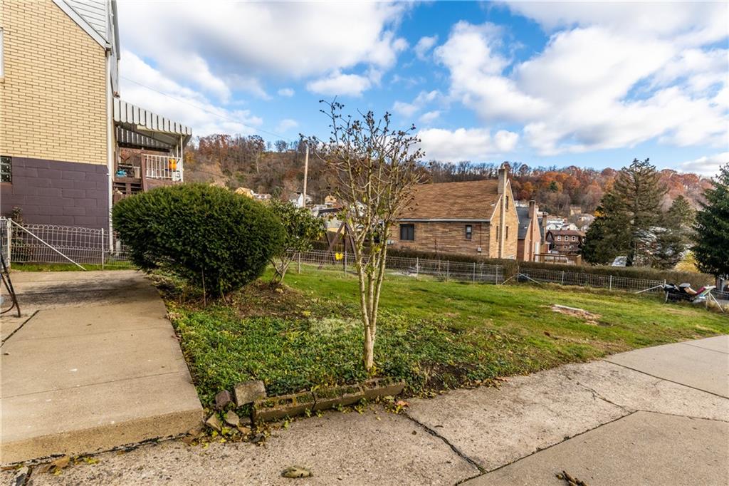 1308 Pine Hollow Road McKees Rocks, PA 15136 - Photo 25 of 25 a view of a garden with a houses