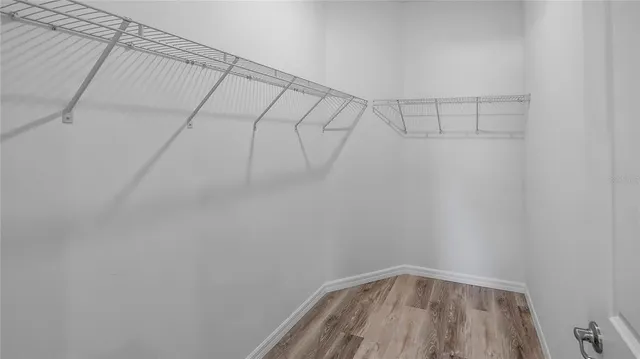 a view of a room with racks on the wall