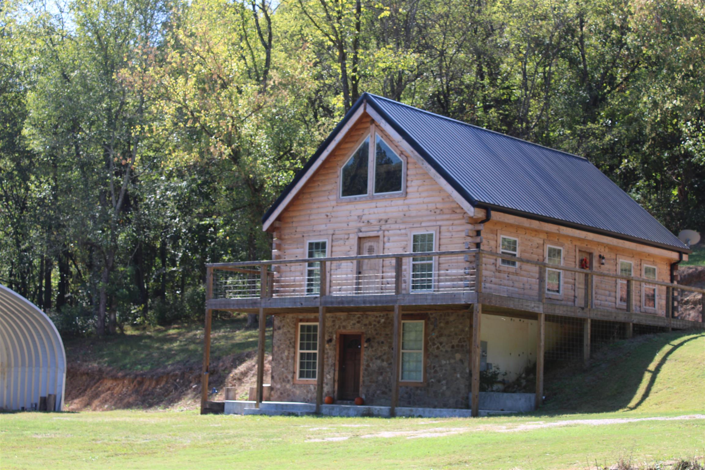 1501 Rolin Hollow Road Ardmore, TN 38449 - Photo 1 of 30 a view of a house with pool
