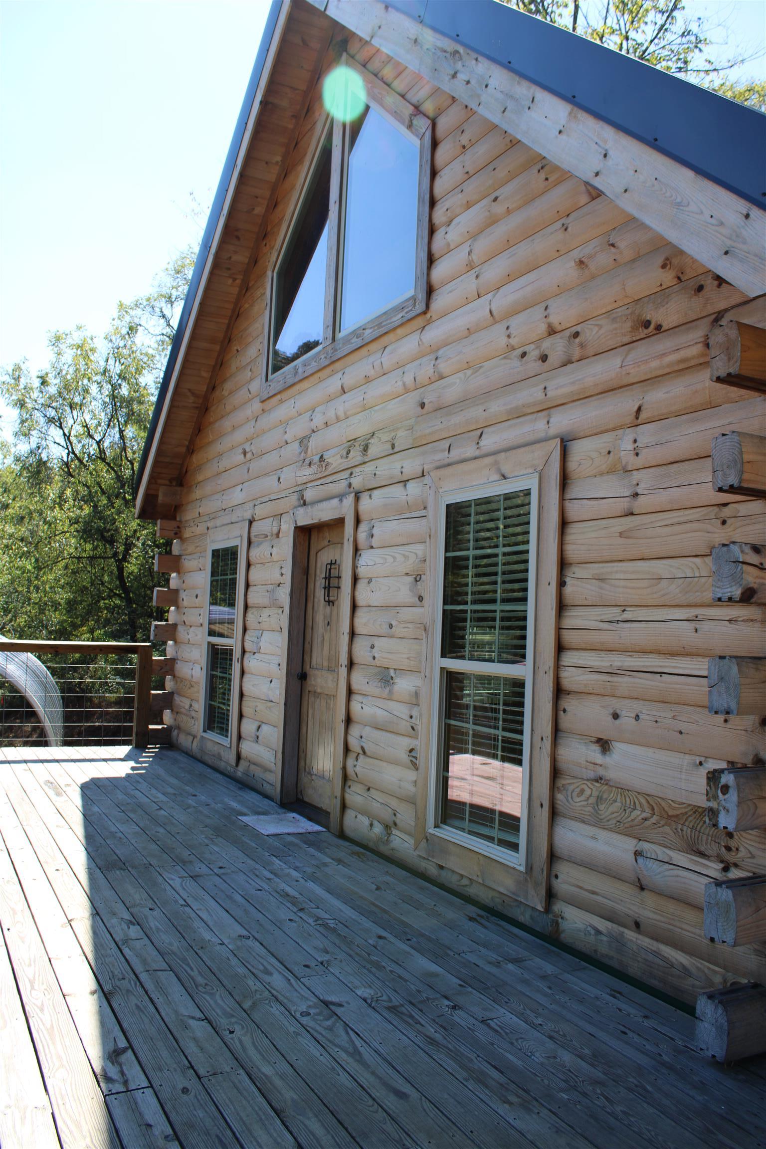 1501 Rolin Hollow Road Ardmore, TN 38449 - Photo 3 of 30 a view of a house with a wooden deck